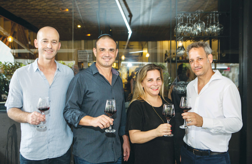  A TOAST and a taste of new wines in the Barkan Altitude series. (From left:) Ido Lewinson, Olivier Prati, Lee Boldes, and Nir Gil. (photo credit: LIOR GOLSAD)