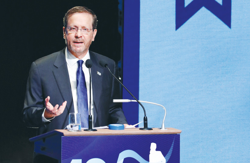  PRESIDENT ISAAC Herzog addresses an event marking the 125th anniversary of the First Zionist Congress at the original venue, in Basel, last year. The commitment to democracy dates back to that first congress, says the writer.  (photo credit: Arnd Wiegmann/Reuters)