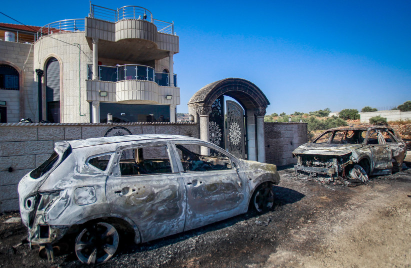 The damage caused to Palestinian homes and cars by Jewish settlers in the West Bank village of Turmus Aya. June 21, 2023.  (photo credit: NASSER ISHTAYEH/FLASH90)