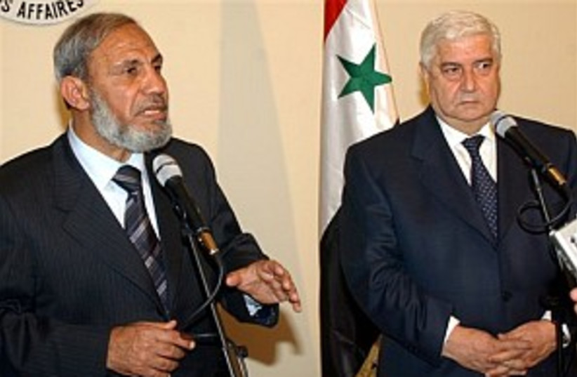 zahar and Syrian FM 298  (photo credit: AP)