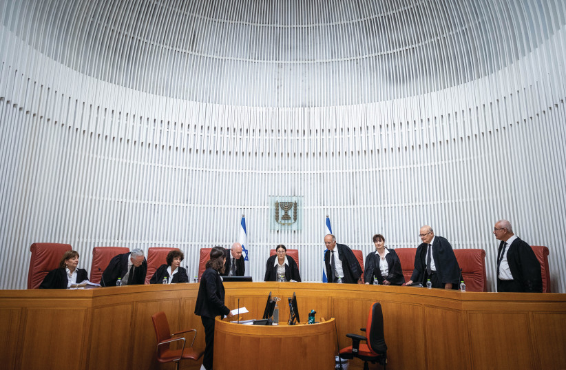  SUPREME COURT justices take their seats for a High Court hearing. (photo credit: YONATAN SINDEL/FLASH90)