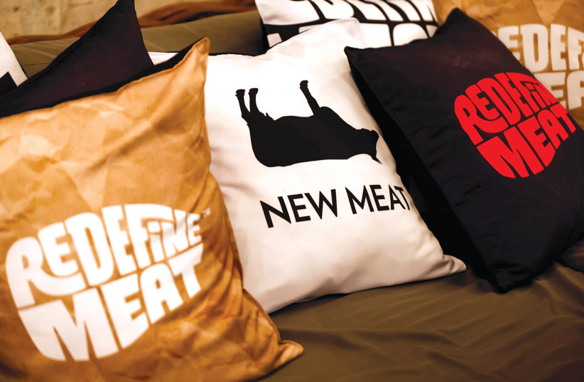 Pillows are displayed at an event marking the international commercial launch of Israeli start-up Redefine Meat’s New-Meat product range in a restaurant in Tel Aviv on November 15, 2021.  (photo credit: AMIR COHEN/REUTERS)
