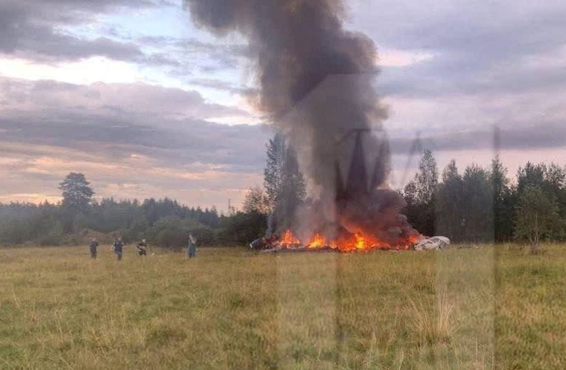  A view shows plane wreckage on fire following an alleged air accident at a location given as Tver region, Russia, in this image published August 23, 2023. (photo credit: OSTOROZHNO NOVOSTI/HANDOUT VIA REUTERS)
