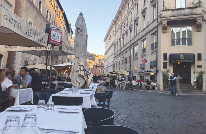  OUTDOOR DINING at Renato al Ghetto, one of the Jewish Ghetto’s many kosher dining options. Artichoke and handmade pasta were the writer’s favorites. (photo credit: HOWARD BLAS)