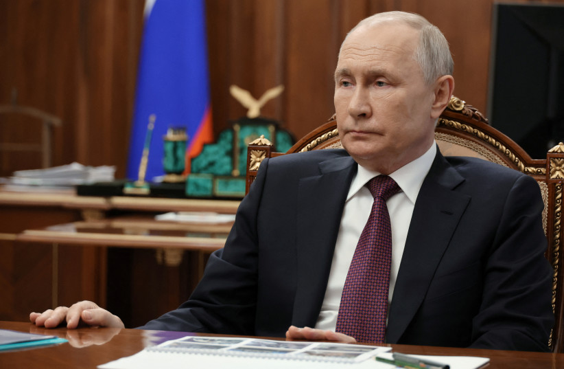  Russian President Vladimir Putin attends a meeting with Denis Pushilin, Moscow-installed acting leader of the Russian-controlled parts of Ukraine's Donetsk region, in Moscow, Russia August 24, 2023. (photo credit: SPUTNIK/MIKHAIL KLIMENTYEV/KREMLIN VIA REUTERS)