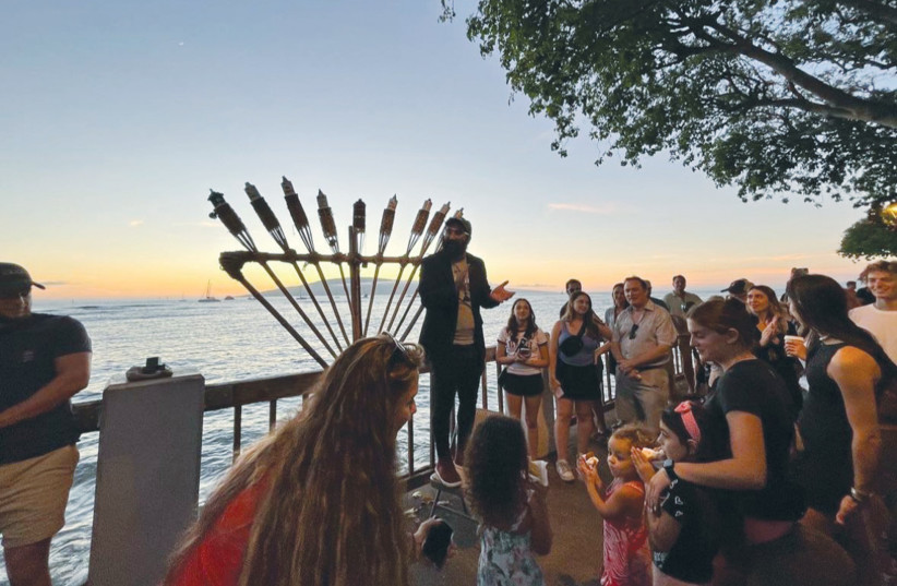  CHABAD OF Maui holds a Hanukkah gathering in Lahaina, this past year. (photo credit: Chabad of Maui)