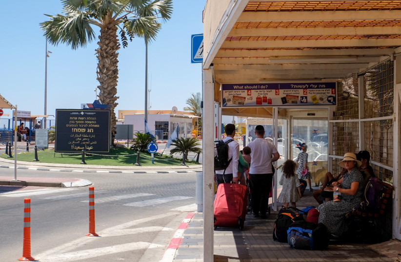  People cross to Egypt through the Taba Border Crossing, during the summer holiday, in the southern Israeli city of Eilat, August 6, 2023 (photo credit: NOAM REVKIN FENTON/FLASH90)