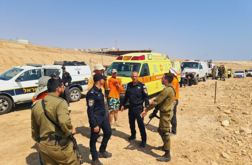  Police and Israeli security personnel respond to an incident in which six people were found in mined IDF territory, one of whom was found dead.  (photo credit: ISRAEL POLICE SPOKESPERSON'S UNIT)