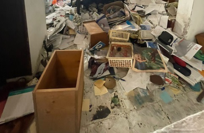  A Holocaust survivor's ransacked home is seen in this edited photo after robbers invaded. (photo credit: NOAM ATIA)