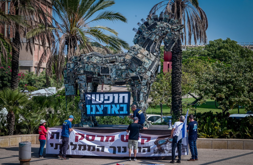  Israeli protest against Education Minister Yoav Kisch outside a conference at Tel Aviv University, on August 28, 2023. (photo credit: AVSHALOM SASSONI/FLASH90)