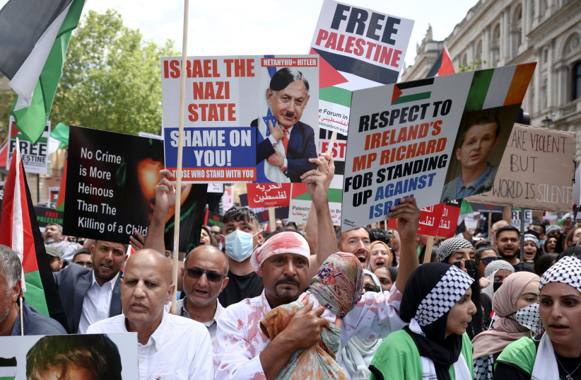  Pro-Palestine protesters demonstrate outside Downing Street in London, Britain, June 12, 2021. (photo credit: REUTERS/HENRY NICHOLLS)