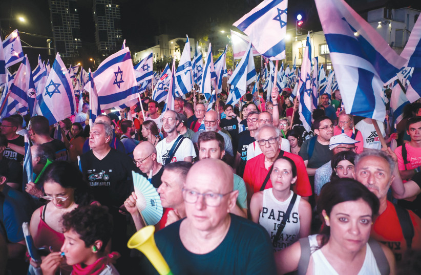  ACTIVISTS OPPOSED to the judicial overhaul demonstrate in Tel Aviv, earlier this month. (photo credit: AVSHALOM SASSONI/FLASH90)