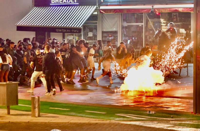  Police and protesters clash at 'Justice for Raphael' protest in Tel Aviv. August 30, 2023 (photo credit: AVSHALOM SASSONI)