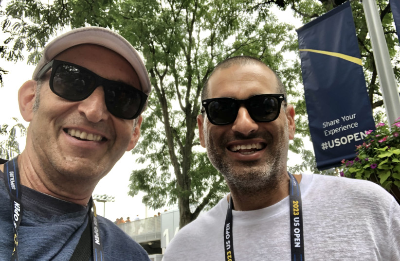  THE WRITER (left) runs into retired Israel tennis legend Andy Ram (right) grounds of the USTA Billie Jean King National Tennis Center in Queens, New York this week. (photo credit: HOWARD BLAS)
