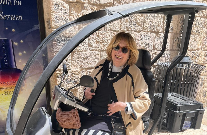  ON HER scooter in Jerusalem’s Mamilla Mall.  (photo credit: H. Gansbourg)