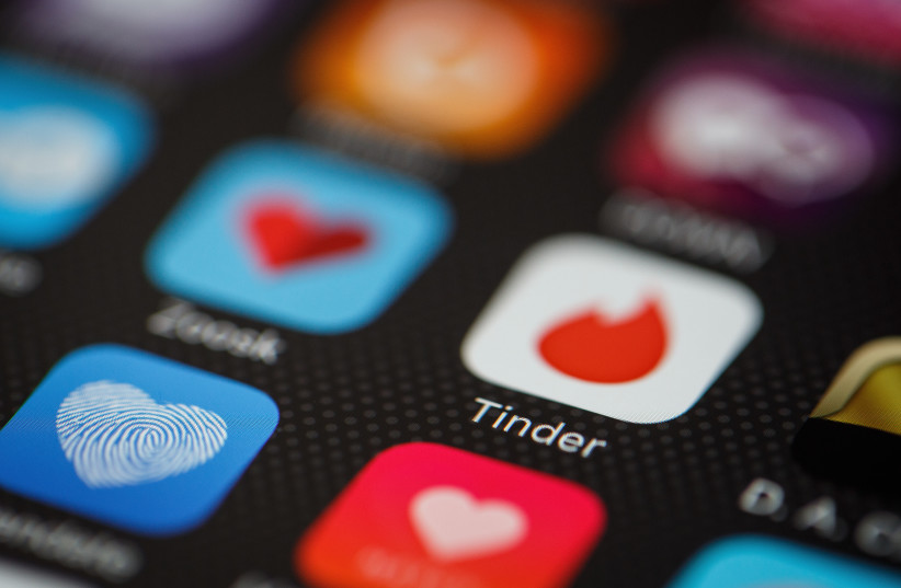  Dating apps (illustrative). (photo credit: Leon Neal/Getty Images)