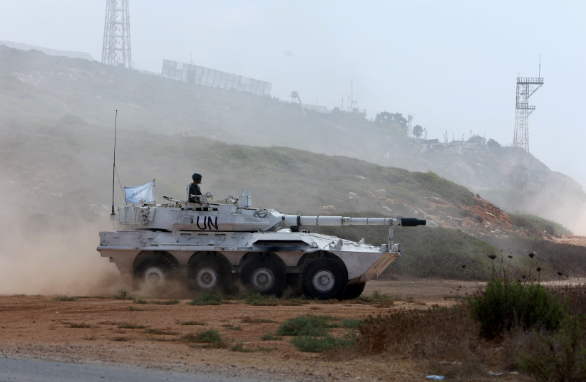 A United Nations peacekeeper (UNIFIL) is pictured on a UN armoured vehicle in Naqoura, near the border with Israel, southern Lebanon, August 31, 2023. (photo credit: REUTERS/AZIZ TAHER)