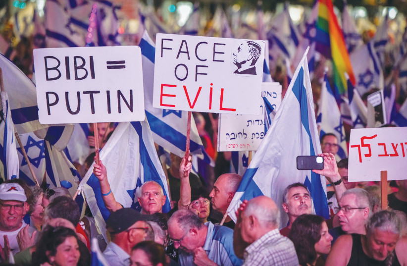  ALL SIDES in the controversies rocking Israeli politics and leading to the unprecedented mass weekly demonstrations have to pull back and allow Prime Minister Benjamin Netanyahu to maximize the diplomatic and defense moment, says the writer. (photo credit: AVSHALOM SASSONI/FLASH90)