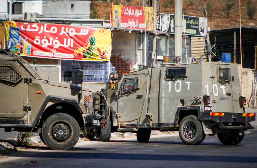  Israeli military vehicles seen during an Israeli military raid in the Palestinian village of Aqaba, in the West Bank, September 1, 2023.  (photo credit: NASSER ISHTAYEH/FLASH90)