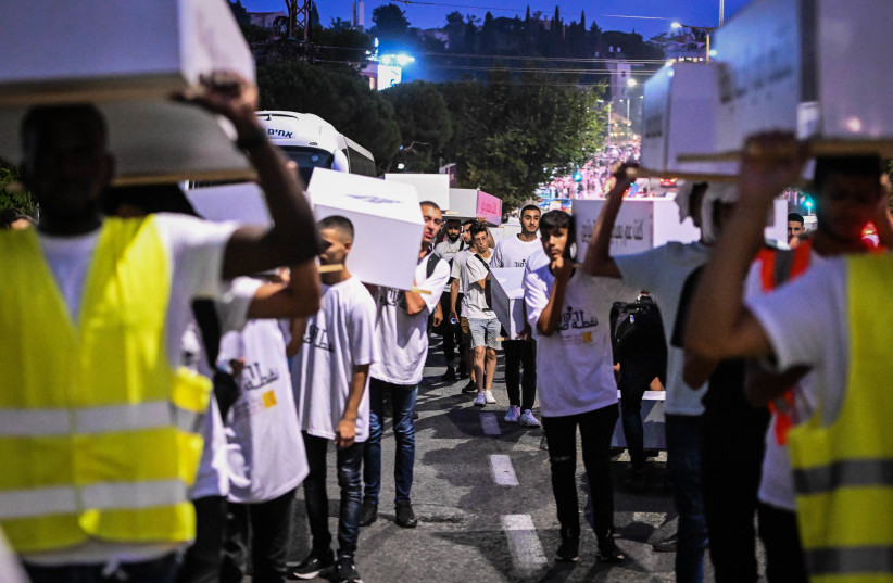  Members of the Arab community march as they protest against the violence in their community, in the northern Israeli city of Haifa, August 31, 2023 (photo credit: FLASH90)