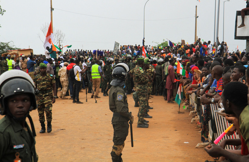 Thousands of Nigeriens gather in front of the French army headquarter, in support of the putschist soldiers and to demand the French army to leave, in Niamey, Niger September 2, 2023 (photo credit: Mahamadou Hamidou/Reuters)
