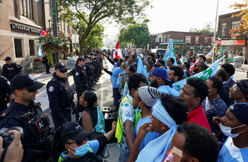  Toronto police work at the scene of a protest held by Eritrean anti-government protestors outside a pro-government event in Toronto, Ontario, Canada September 2, 2023. (photo credit: REUTERS)