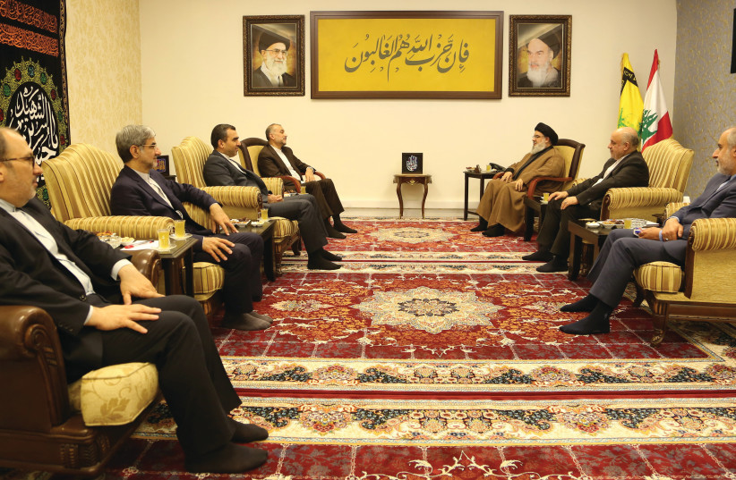 HEZBOLLAH LEADER Sheikh Hassan Nasrallah meets with Iranian Foreign Minister Hossein Amir-Abdollahian, in Lebanon, in a photo released on Friday. (photo credit: Hezbollah Media Office/Reuters)