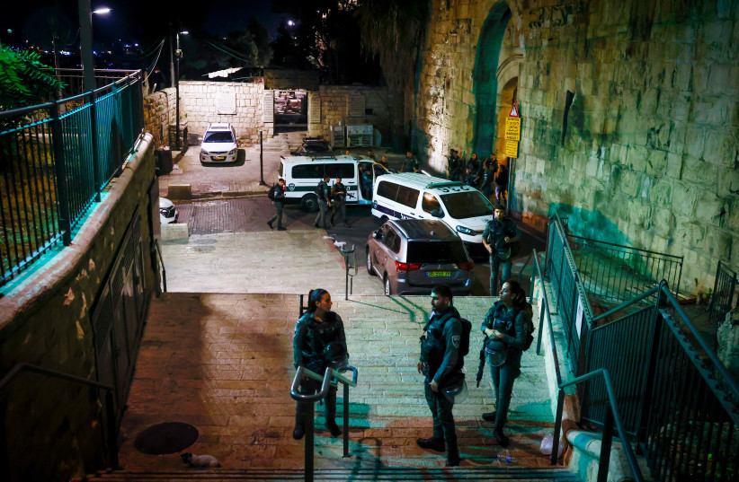  Police near the scene of an attempted stabbing attack at the Lion's gate in Jerusalem's Old City. September 4, 2023 (photo credit: Chaim Goldberg/Flash90)