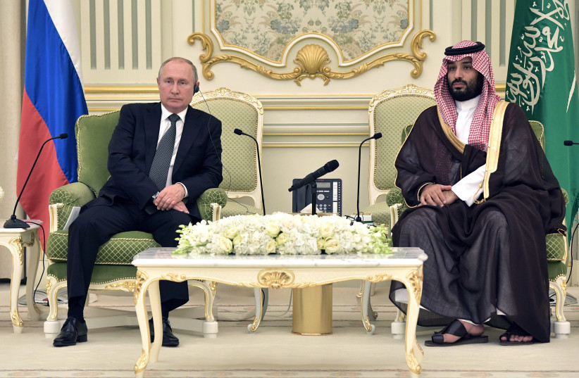  Russian President Vladimir Putin and Saudi Arabia's Crown Prince Mohammed bin Salman attend a meeting in Riyadh, Saudi Arabia, October 14, 2019 (photo credit: SPUTNIK/ALEXEI NIKOLSKY/KREMLIN VIA REUTERS)