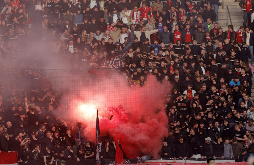  AZ Alkmaar fans seen with flairs in the AFAS Stadion, Alkmaar, Netherlands (photo credit: REUTERS/PIROSCHKA VAN DE WOUW)