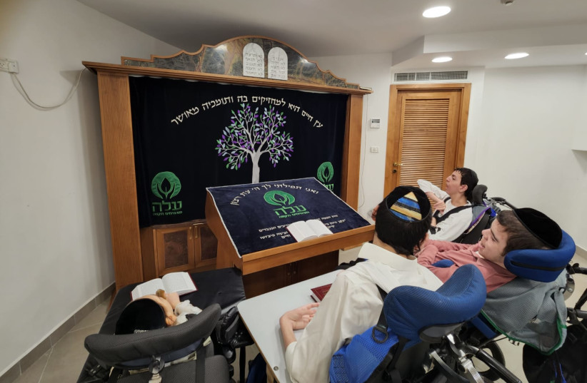  Young Jewish worshipers with disabilities seen at the new Accessible Synagogue in Bnei Brak (photo credit: ALEH)