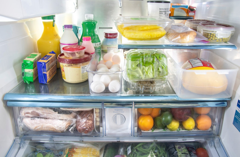 Food organized in a refrigerator.  (photo credit: RAWPIXEL)