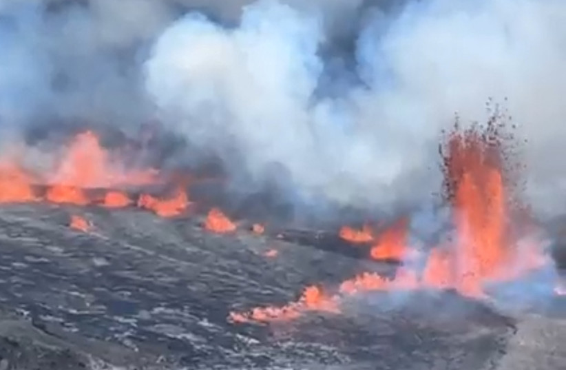 A view of volcanic activity at the Halemaumau Crater, in Hawaii, U.S. September 10, 2023 in this screen grab obtained from social media video.  (photo credit: Big Island VIP/REUTERS)