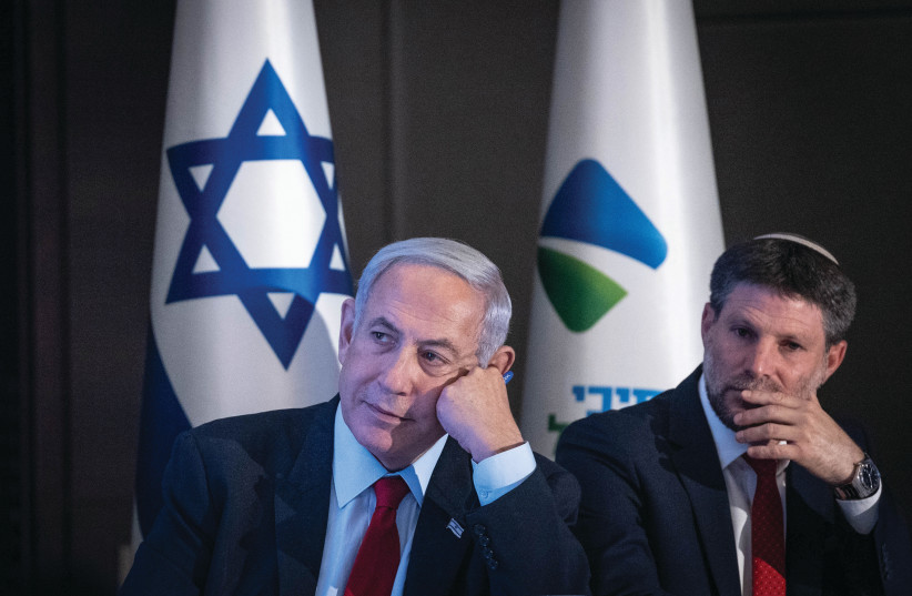  PRIME MINISTER Benjamin Netanyahu and Finance Minister Bezalel Smotrich attend a news conference. (photo credit: Chaim Goldberg/Flash90)