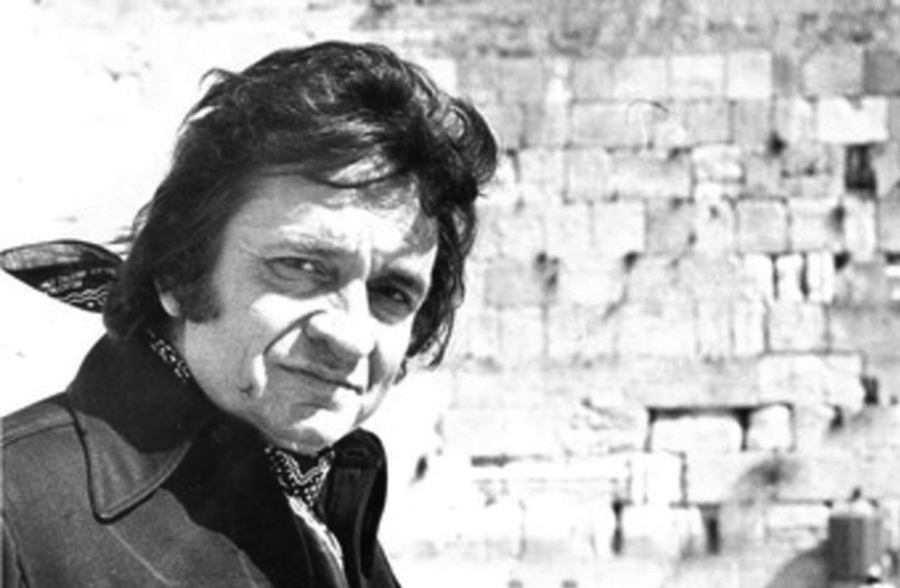  JOHNNY CASH at the Kotel in the 1970s. (photo credit: Jerusalem Post archives)