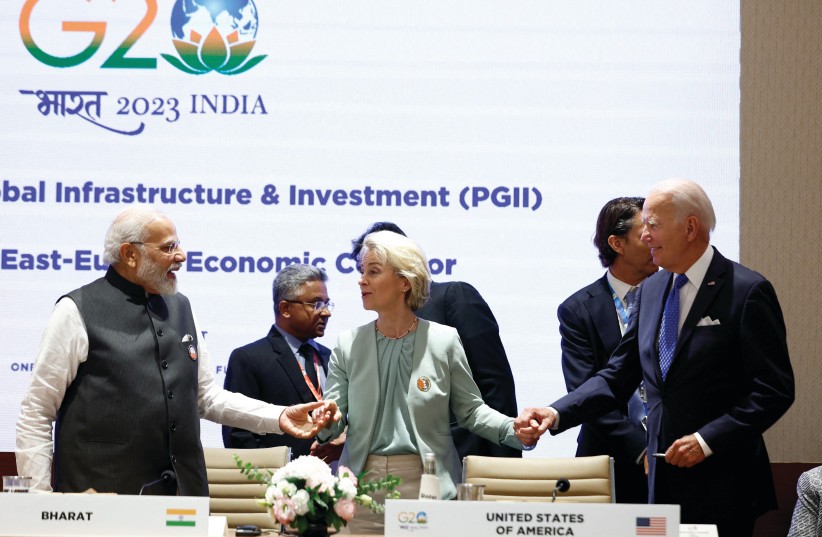  EUROPEAN UNION President Ursula von der Leyen is flanked by Indian Prime Minister Narendra Modi and US President Joe Biden at the G20 summit in New Delhi, last Saturday. (photo credit: EVELYN HOCKSTEIN/REUTERS)