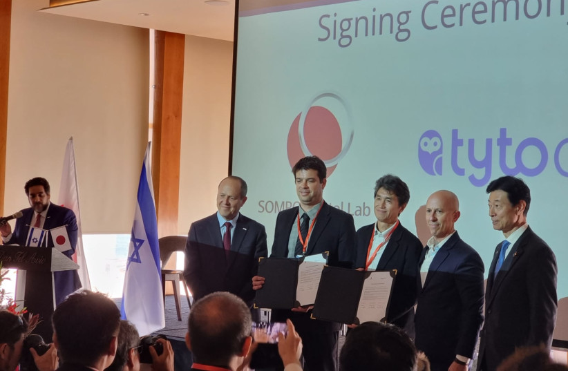   Sompo and TytoCare representatives, together with the Ministers of Economy of Japan and Israel, at the agreement signing ceremony. (photo credit: David HaCohen)