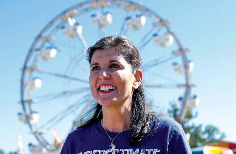  Republican presidential candidate Nikki Haley tours Thrillville at the Iowa State Fair in Des Moines on August 12.  (photo credit: EVELYN HOCKSTEIN/REUTERS)