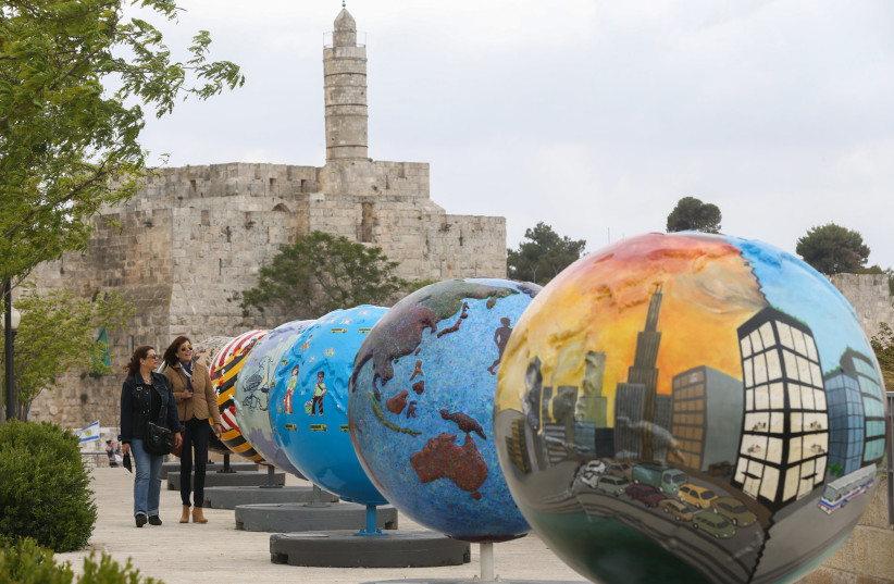  ART INSTALLATION with each globe symbolizing a solution to climate change; in Jerusalem, 2013. (photo credit: NATI SHOHAT/FLASH90)
