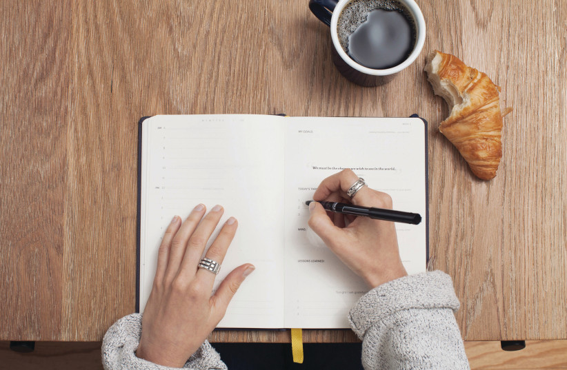  PICK THREE things you'd like to work on and write them down. (photo credit: CATHRYN LAVERY/UNSPLASH)