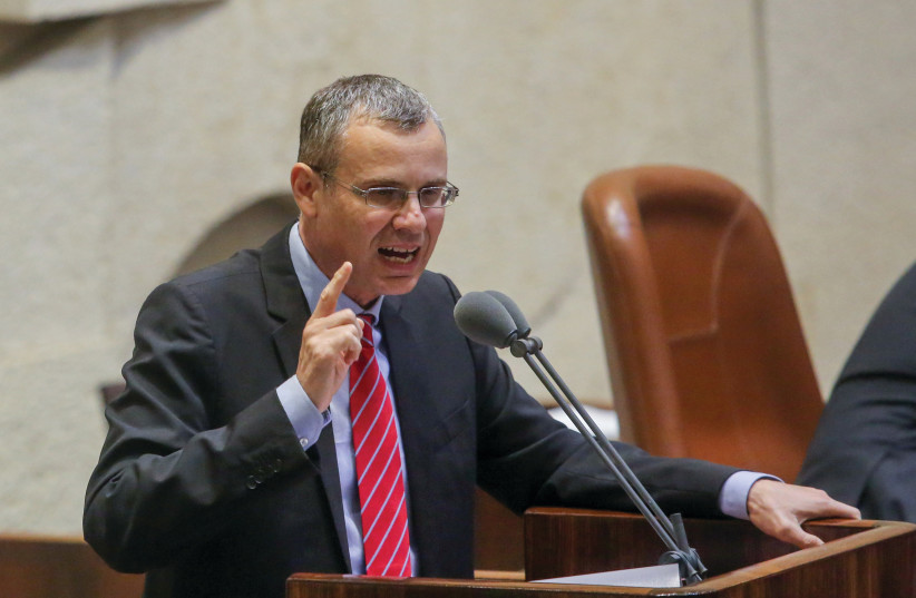  JUSTICE MINISTER Yariv Levin presents the reasonableness clause to the Knesset in July.  (photo credit: MARC ISRAEL SELLEM/THE JERUSALEM POST)