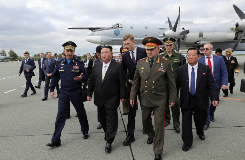  North Korea's leader Kim Jong Un and Russia's Defence Minister Sergei Shoigu inspect Russian military aircraft and missiles put on display at Knevichi aerodrome near Vladivostok in the Primorsky region, Russia, September 16, 2023. (photo credit: Russian Defence Ministry/Handout via REUTERS)