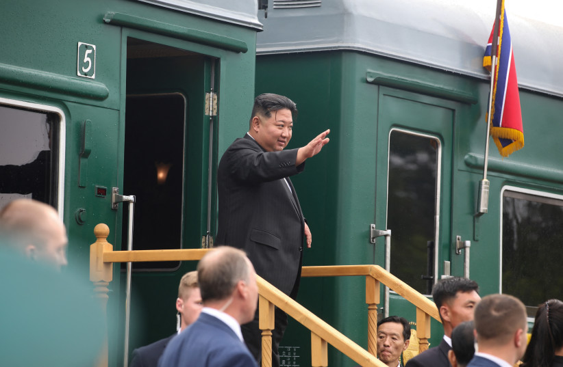  North Korean leader Kim Jong Un waves as he boards his train at a railway station in the town of Artyom outside Vladivostok in the Primorsky region, Russia, September 17, 2023 (photo credit: REUTERS)
