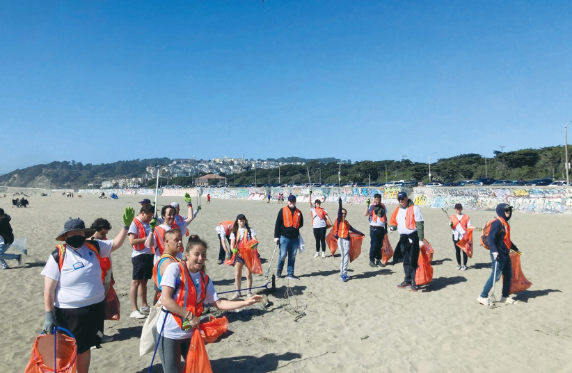 REPAIR THE WORLD runs a beach cleanup along San Francisco Bay.  (photo credit: REPAIR THE WORLD)