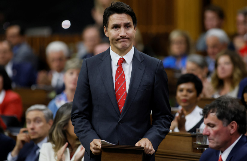 Canada's Prime Minister Justin Trudeau rises to make a statement in the House of Commons on Parliament Hill in Ottawa, Ontario, Canada September 18, 2023. (photo credit: REUTERS/BLAIR GABLE)