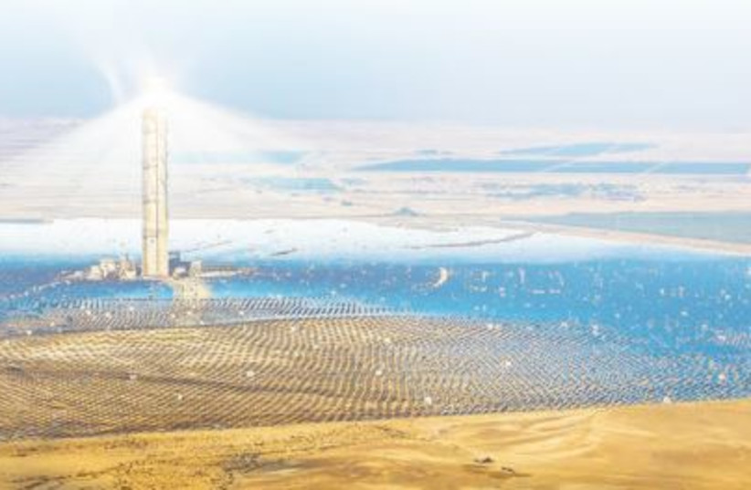  THE ASHALIM solar power station in the Negev desert shown in this illustrative photo, provides 121 megawatt of electricity, equivalent to 2% of the Israeli consumption. Developing solar fields will employ 10,000 Bedouin and create 5,000 MW of clean power, the writer says. (photo credit: YONATAN SINDEL/FLASH90)