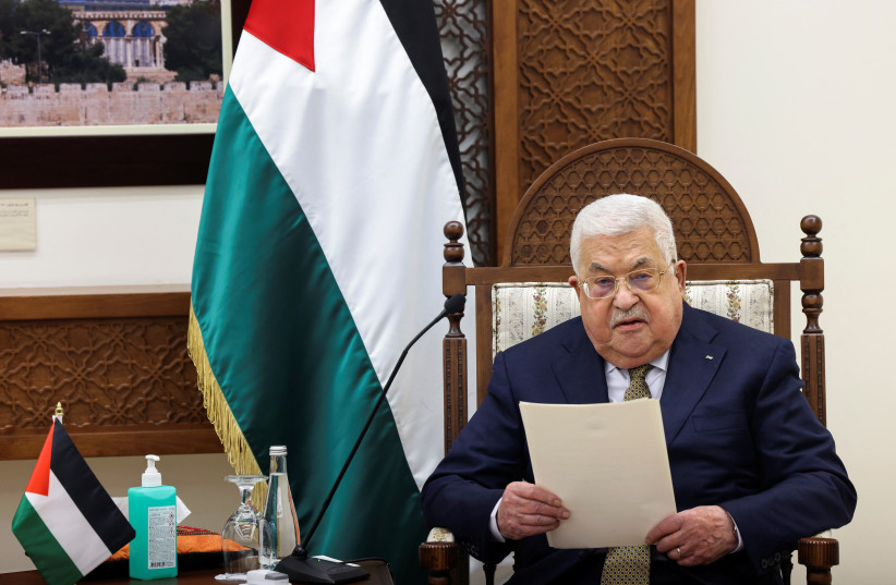  Palestinian leader Mahmoud Abbas reads a statement during a meeting with U.S. Secretary of State Antony Blinken (not seen) in Ramallah in the Israeli-occupied West Bank January 31, 2023. (photo credit: RONALDO SCHEMIDT/POOL VIA REUTERS)