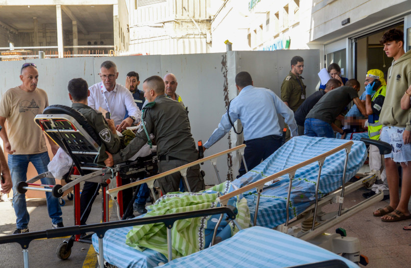  Wounded Israelis arrive to the Soroka Medical center in Beersheba, southern Israel, October 7, 2023. (photo credit: DUDU GREENSPAN/FLASH90)