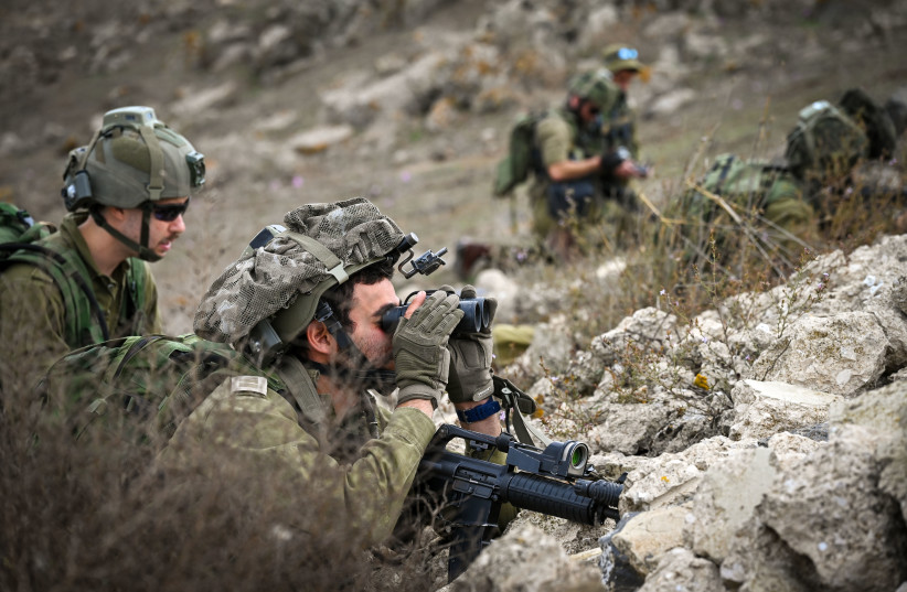  Israeli reserve soldiers seen during a military training in the Golan Heights, northern Israel, on October 27, 2023 (photo credit: MICHAEL GILADI/FLASH90)