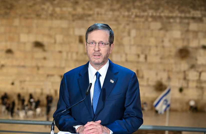  President Isaac Herzog addresses the Washington DC Israel rally from the Western Wall in Jerusalem. November 14, 2023. (photo credit: KOBI GIDON / GPO)